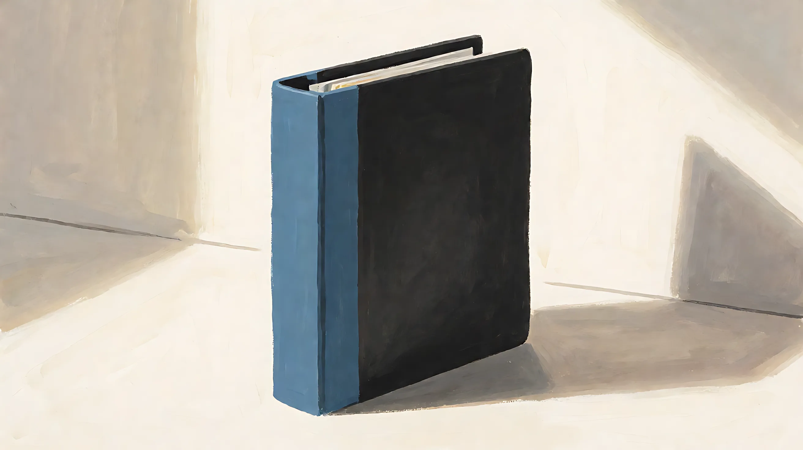 A closed binder standing upright, charcoal cover and solid muted-blue spine