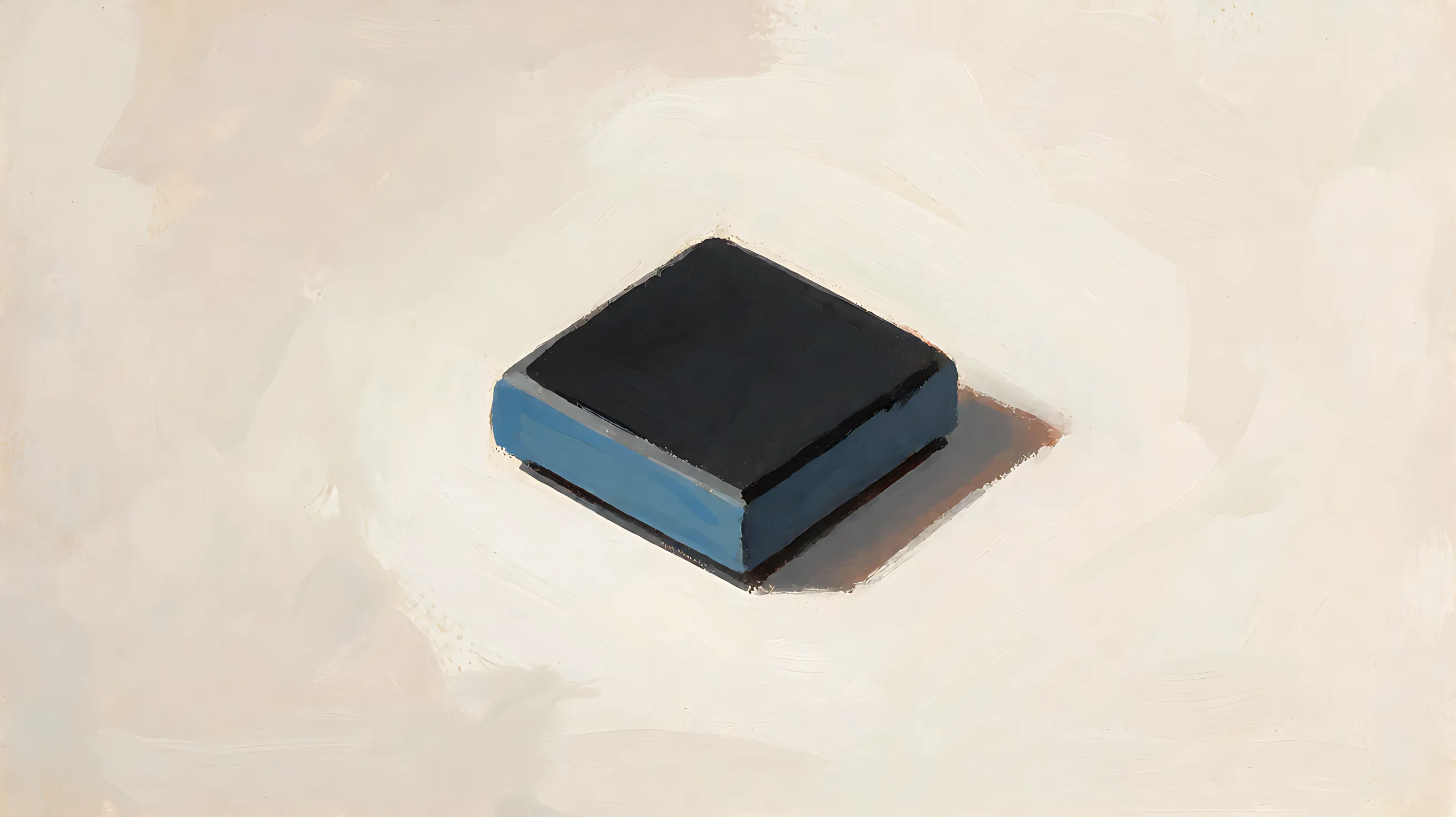A square circuit chip, charcoal on top and muted blue on one side