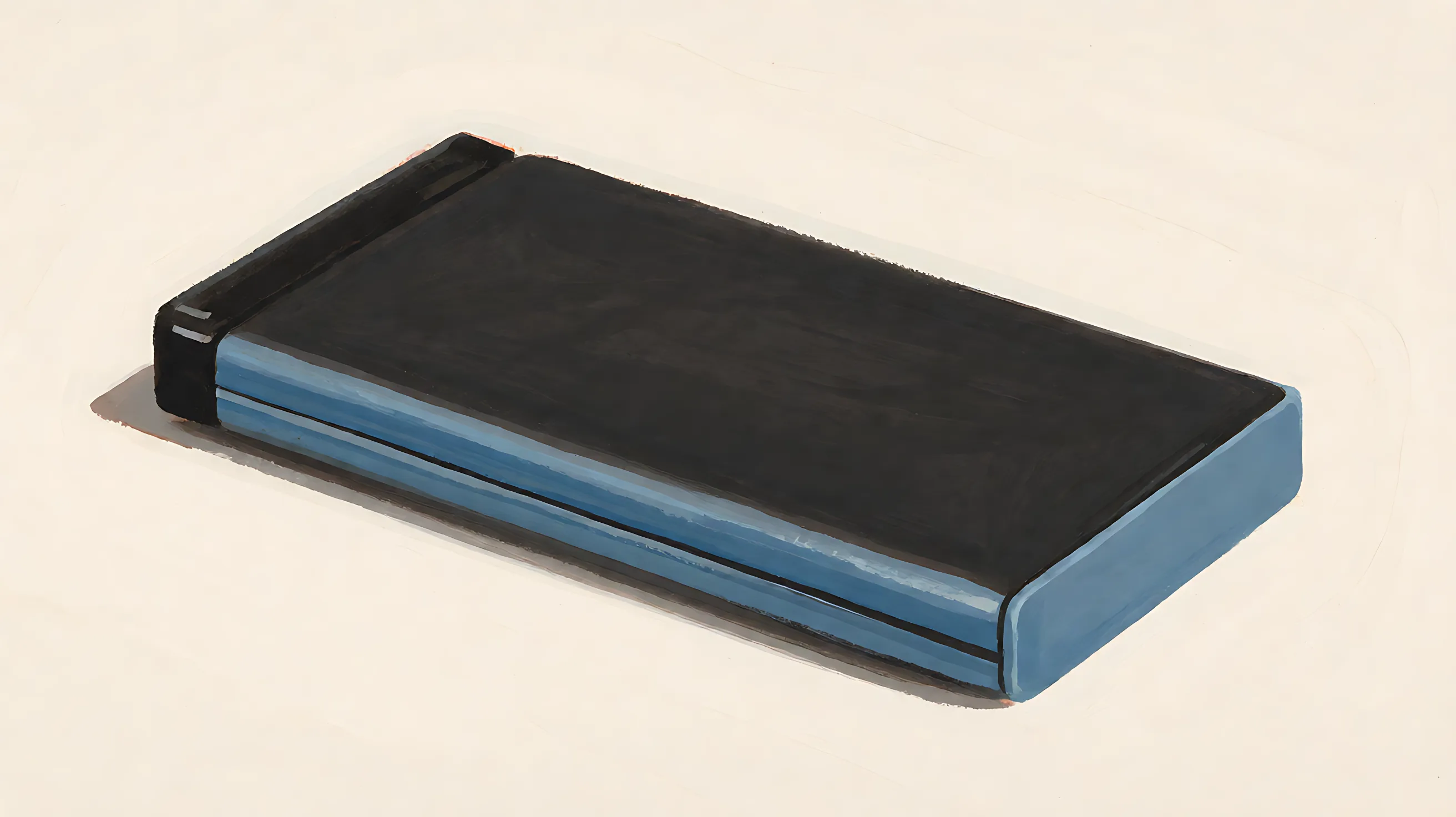 A flat battery pack, charcoal top, muted blue side